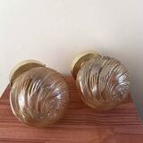 Pair of golden globe wall lights