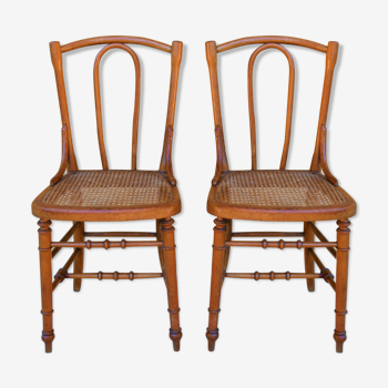 Pair of bistro chairs canned, made in France, by model BvV deposited