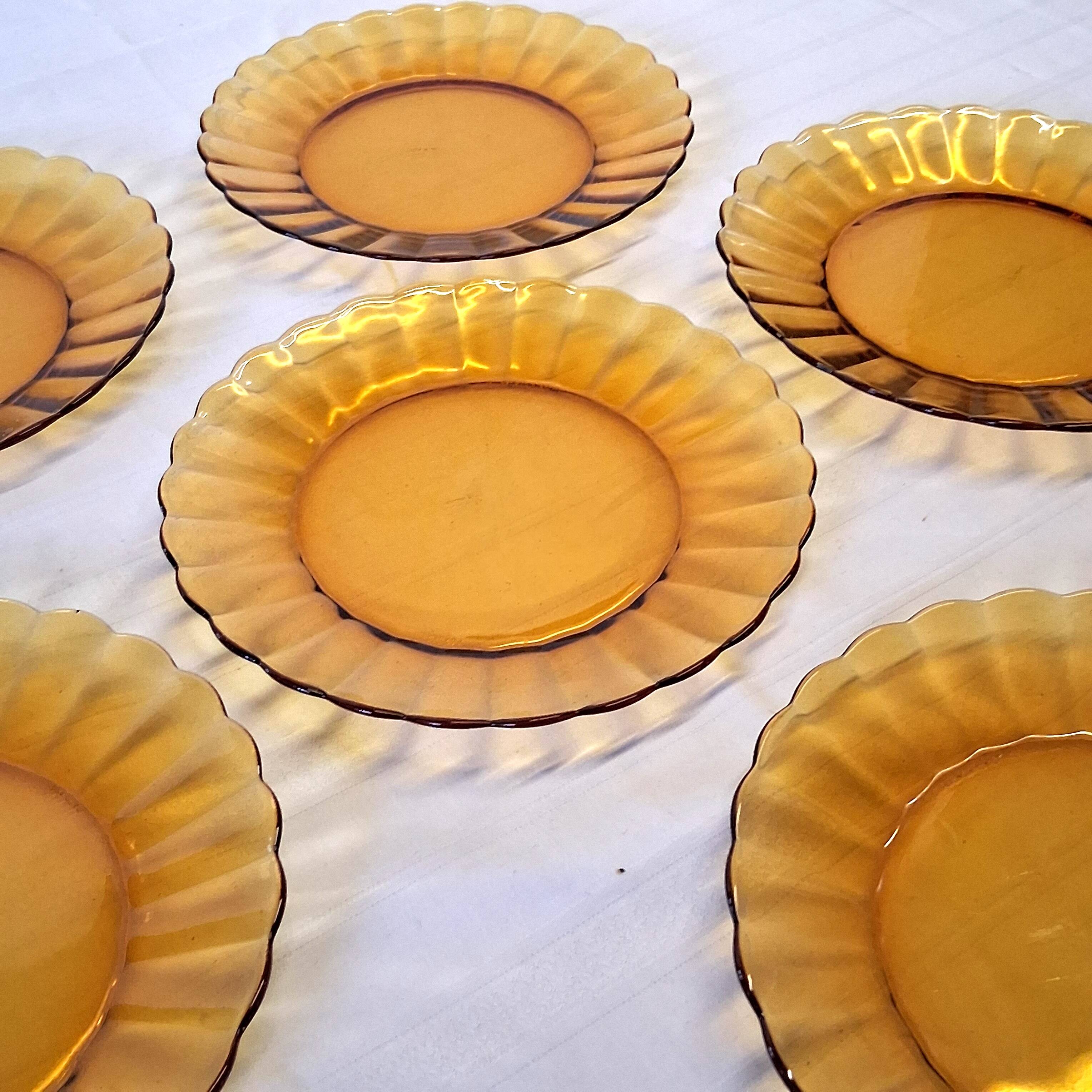 6 Duralex dessert plates in good condition, made of amber-yellow glass