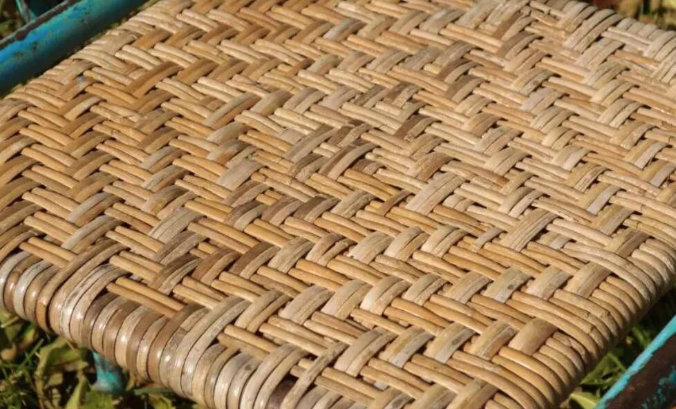 Wrought iron and rattan garden chairs