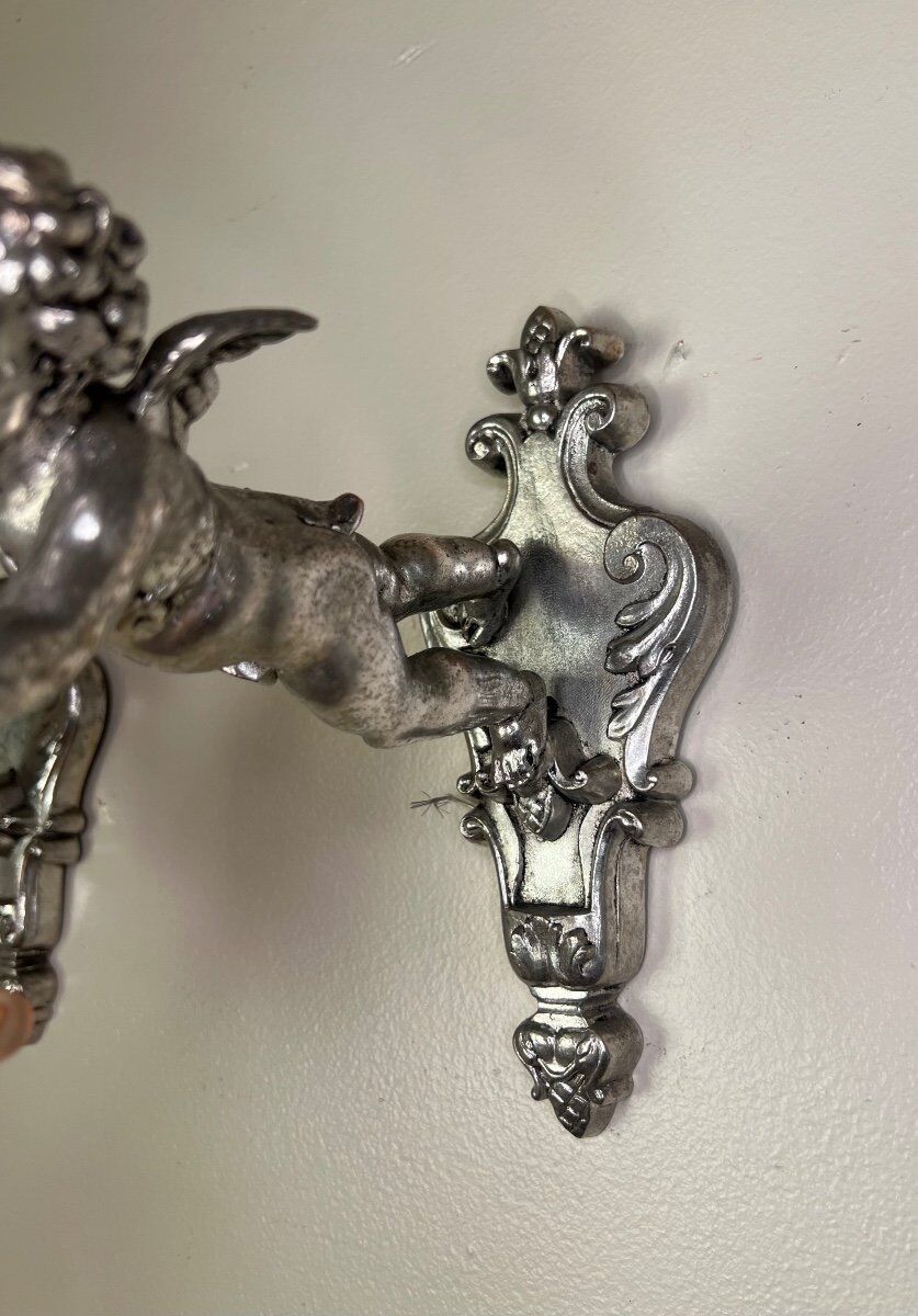 Pair of wall sconces, cherubs, angels, silvered
