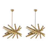 Pair of matte gold-plated brass chandeliers. Italian work from the 1970s.