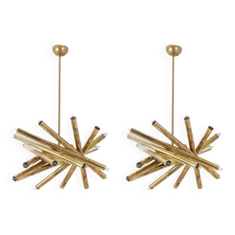Pair of matte gold-plated brass chandeliers. Italian work from the 1970s.