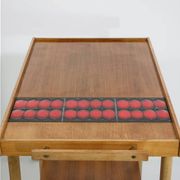 Vintage rolling bar or serving trolley, red ceramic, 1950s design