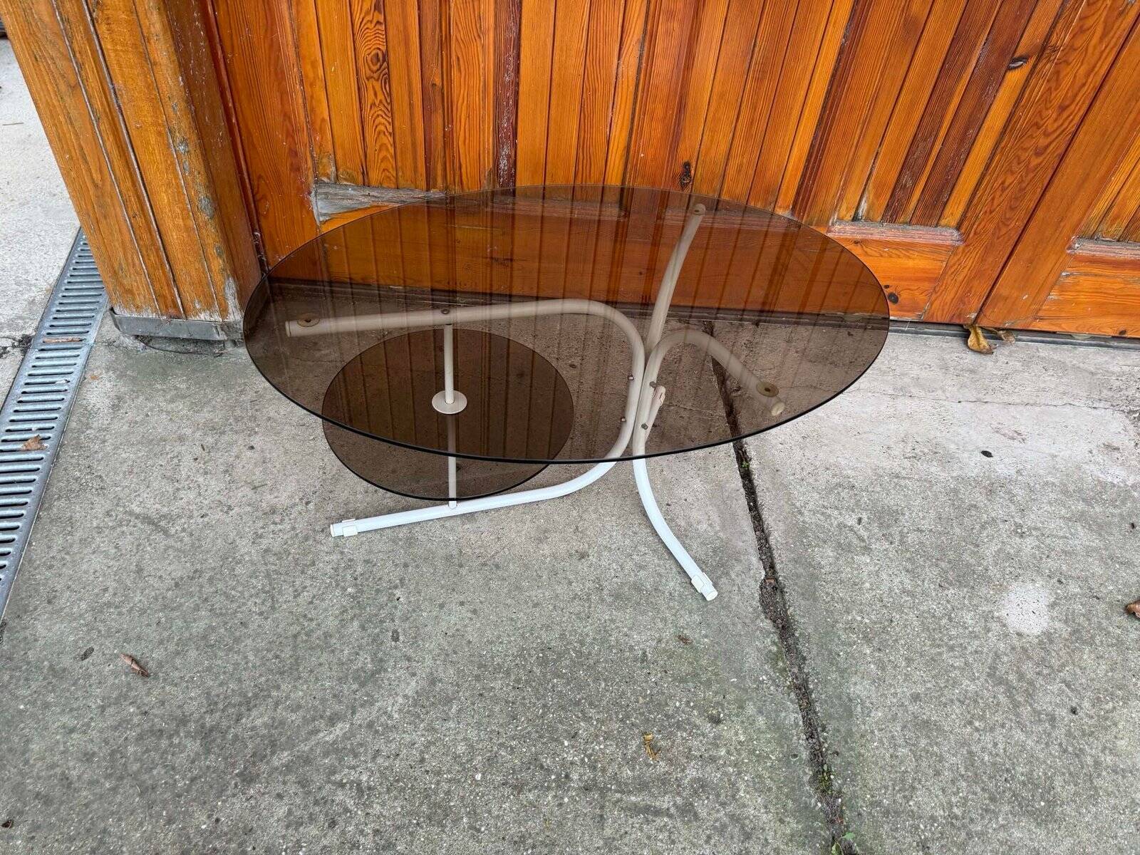Coffee oval table with metal legs and smoky glass top, 1990s