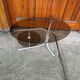 Coffee oval table with metal legs and smoky glass top, 1990s