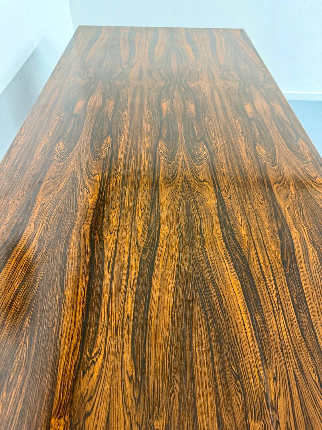 Vintage desk with rosewood veneer and chrome metal design from the 1970s.