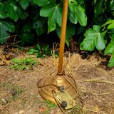 Golden floor lamp with opaline glass lampshade