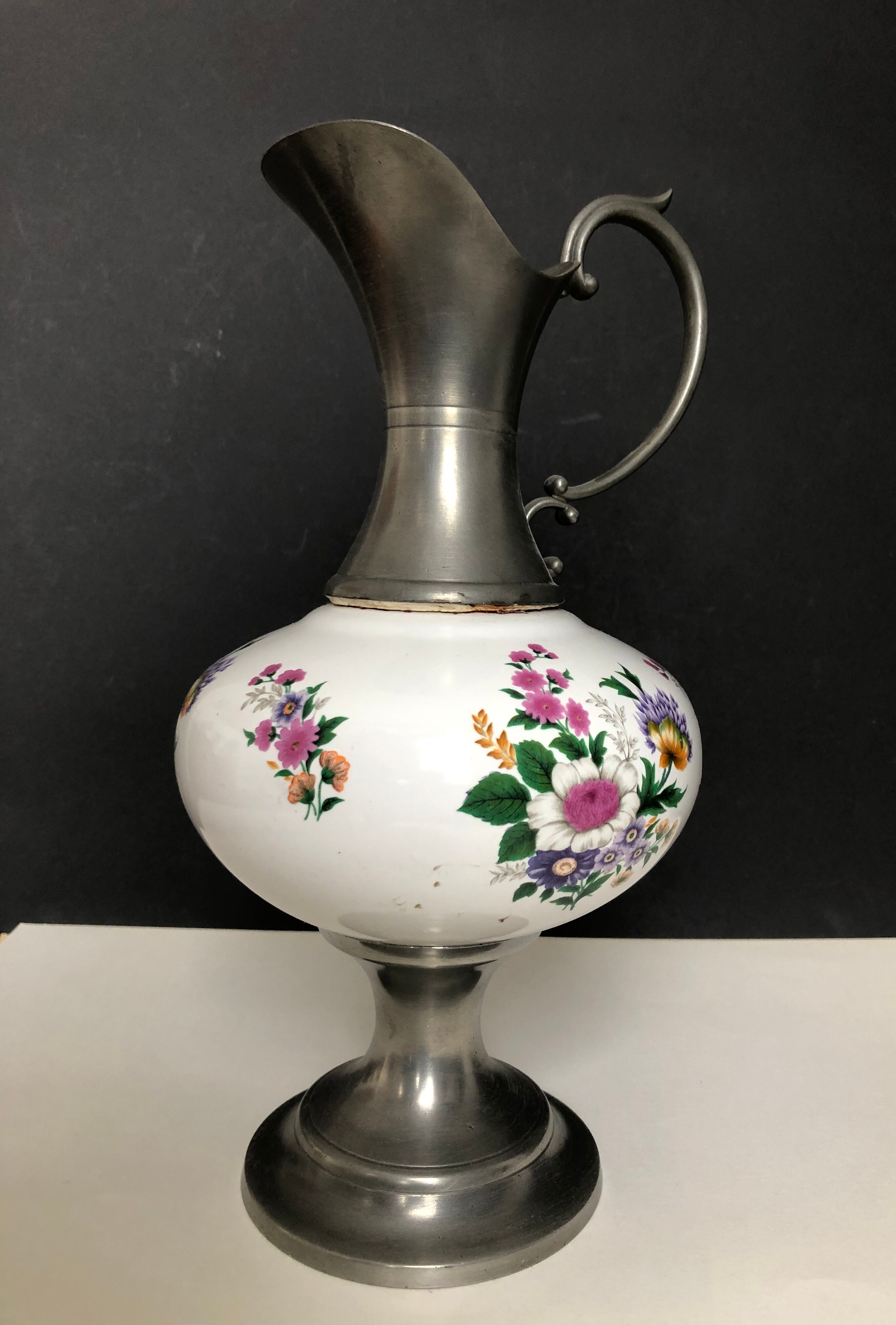 Ceramic and tin pitcher