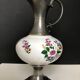 Ceramic and tin pitcher