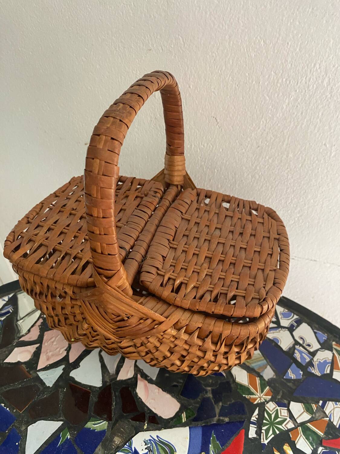 Brown woven vintage wicker basket with 2 lids.