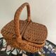 Brown woven vintage wicker basket with 2 lids.
