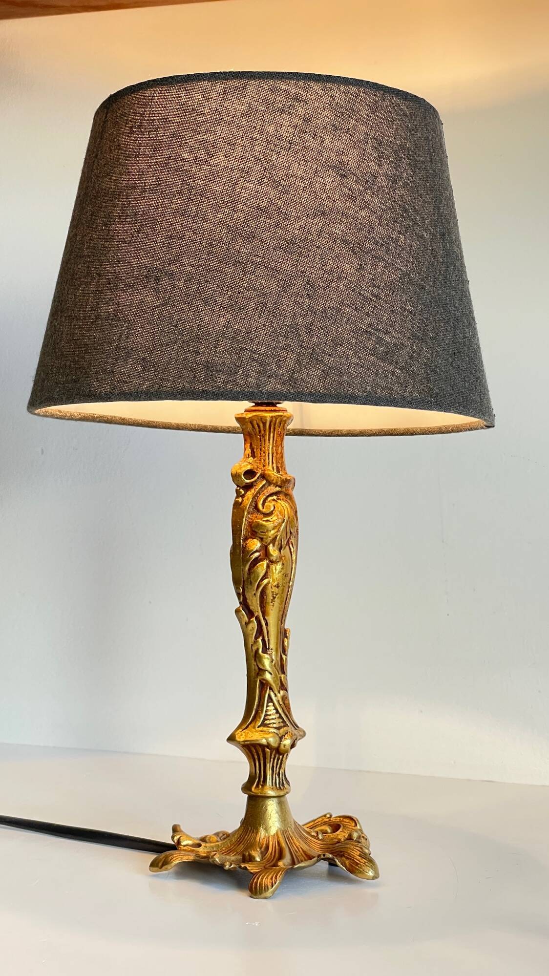 Chic bronze lamp with vintage gold patina