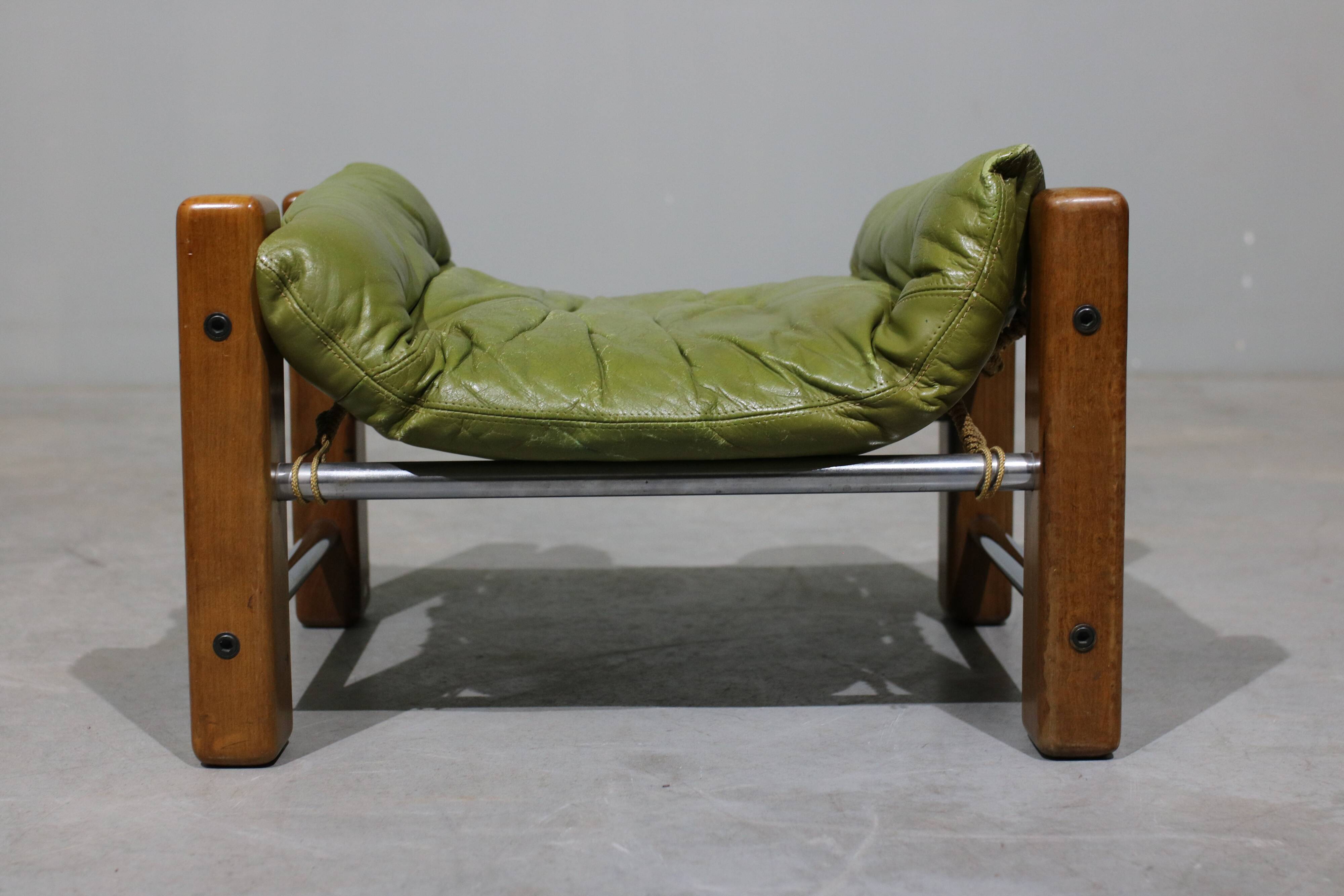 Leather Armchair and Ottoman by Jean Gillon