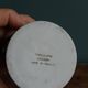 Vase Virebent porcelain cylindrical roll shape with a deep neck.