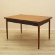 Danish extendable dining table, teak veneer, solid wood legs, leaf storage, 1970s