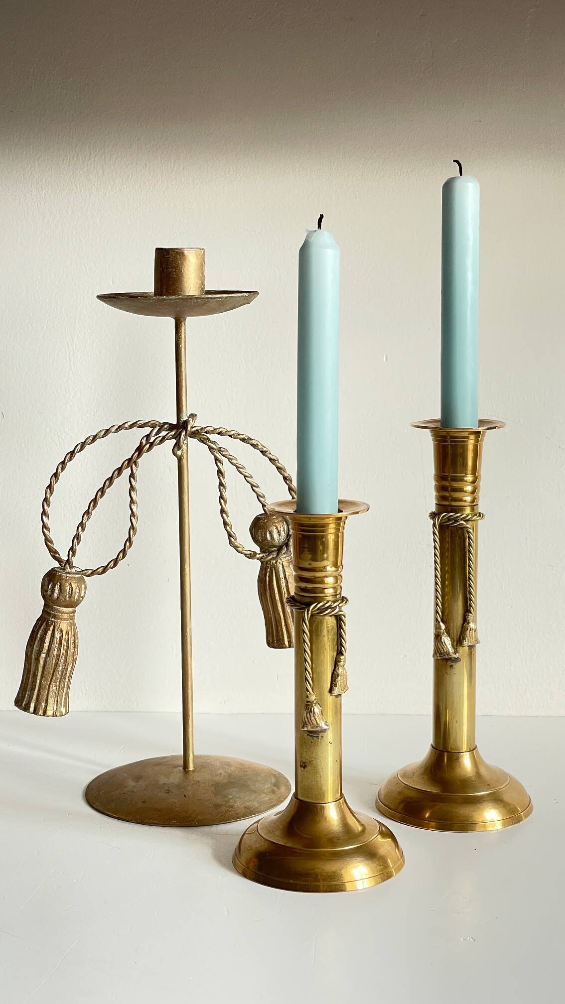 Trio of vintage knotted candlesticks brass