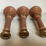 Trio of large brown and gold candlesticks