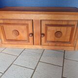 Low oak furniture in the Dudouyt style, with a sculpted front.