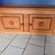 Low cabinet in solid oak in the Dudouyt style, sculpted front.