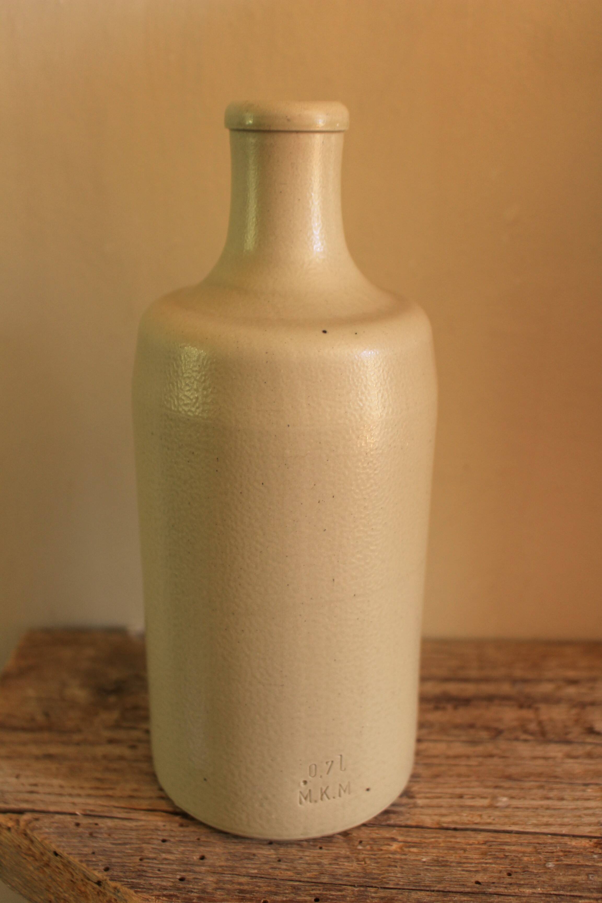 Vintage stoneware liqueur bottle