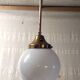 Art Deco pendant light in brass and opaline - mid-20th century