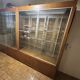 Set of 2 large vintage wooden and glass display cabinets – integrated lighting