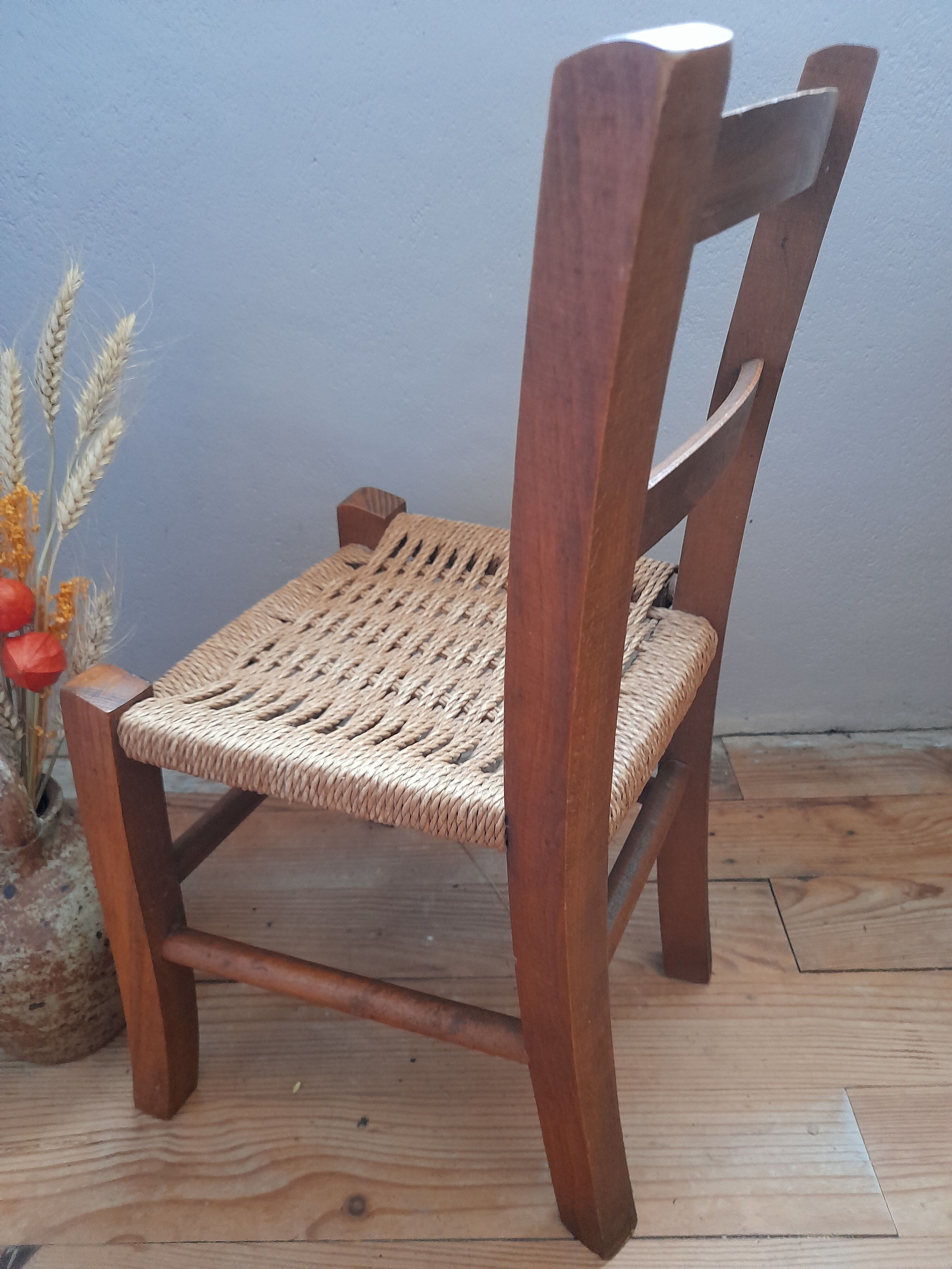 Wooden children's chair, rope seat, circa 1950