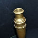 Antique baluster candlestick in bronze with hand-chiseled design.