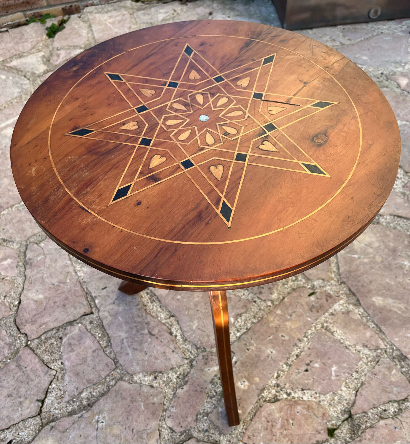 Old inlaid pedestal table