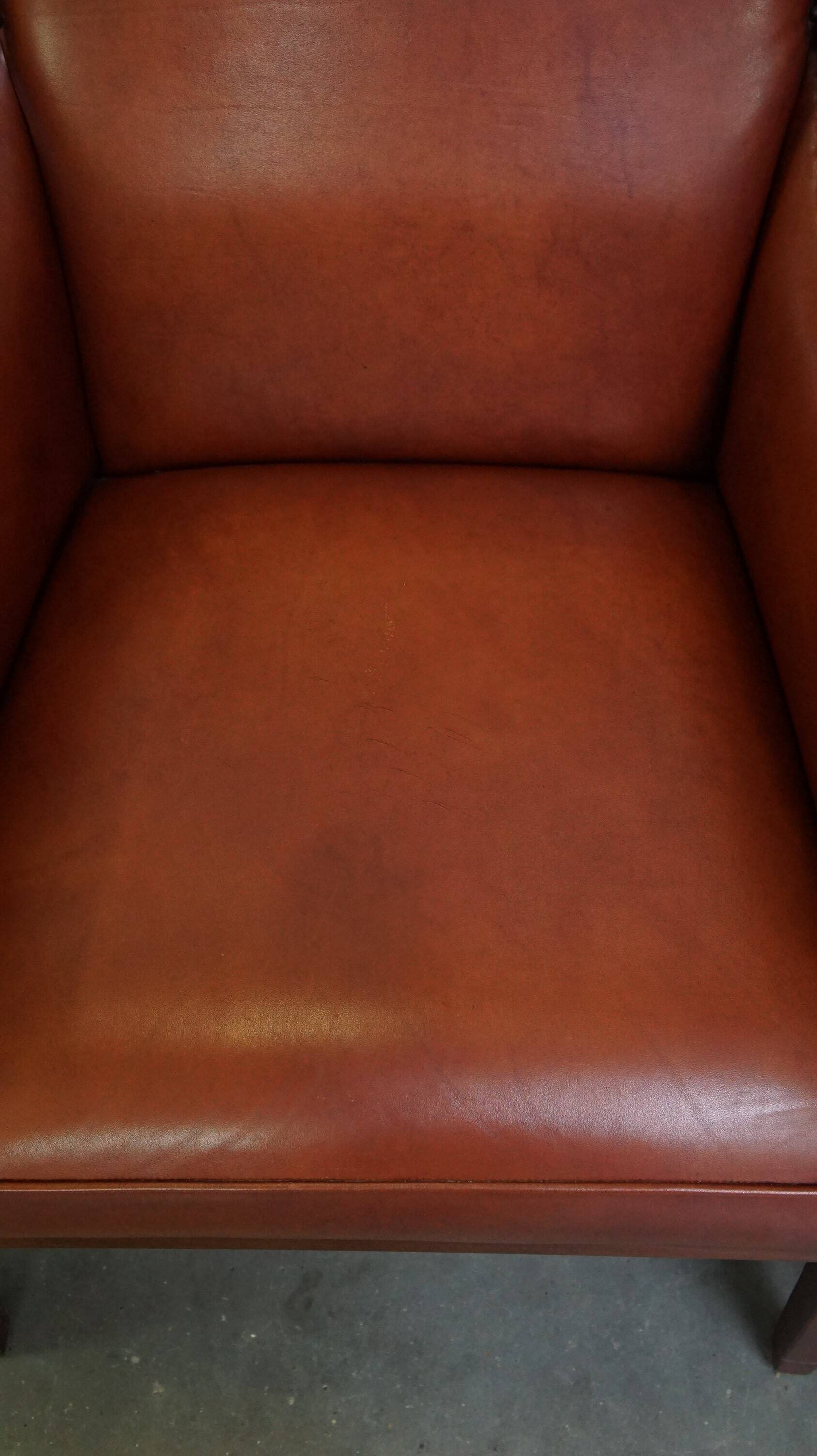 Ensemble majestueux et luxueux de 4 fauteuils design Art Déco en cuir de vachette couleur cognac