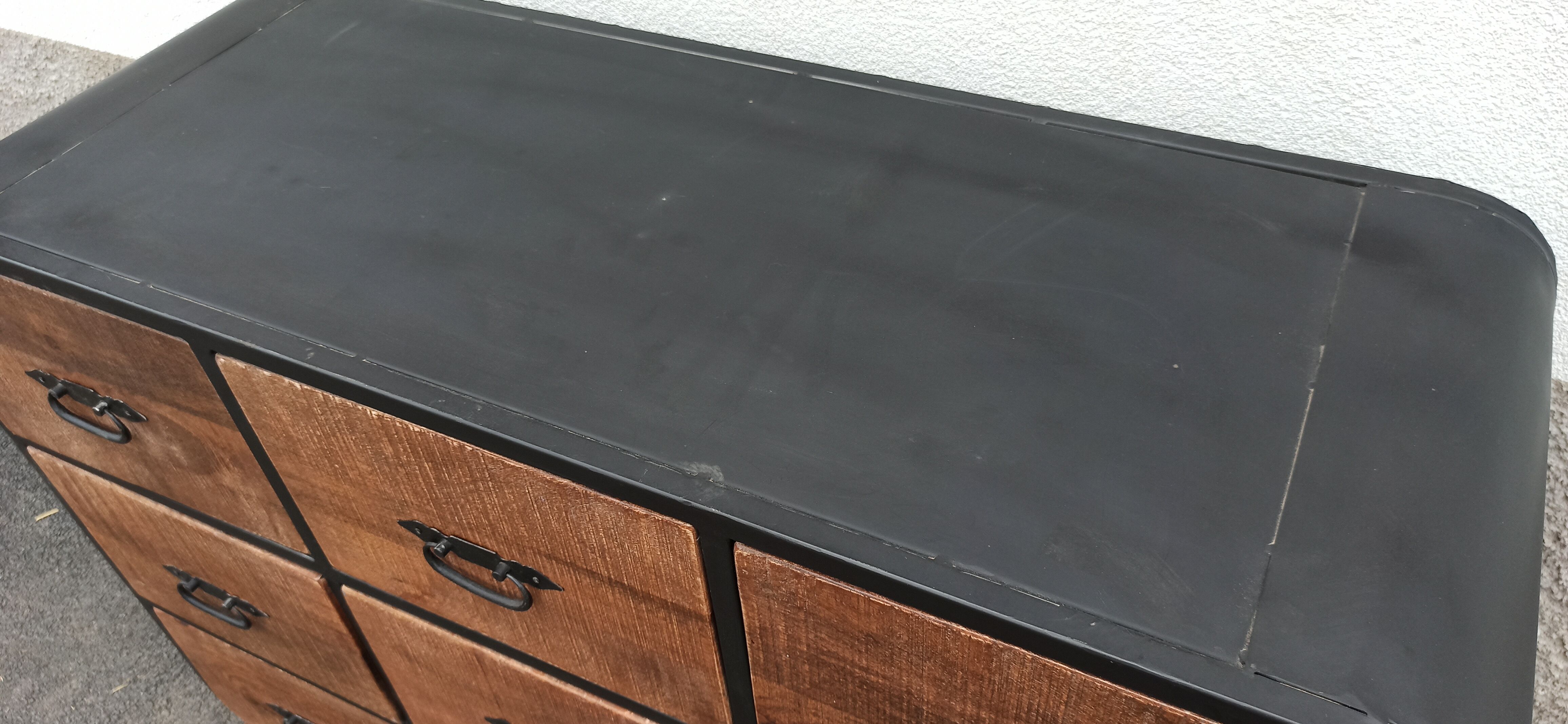 Black metal sideboard with wooden drawers
