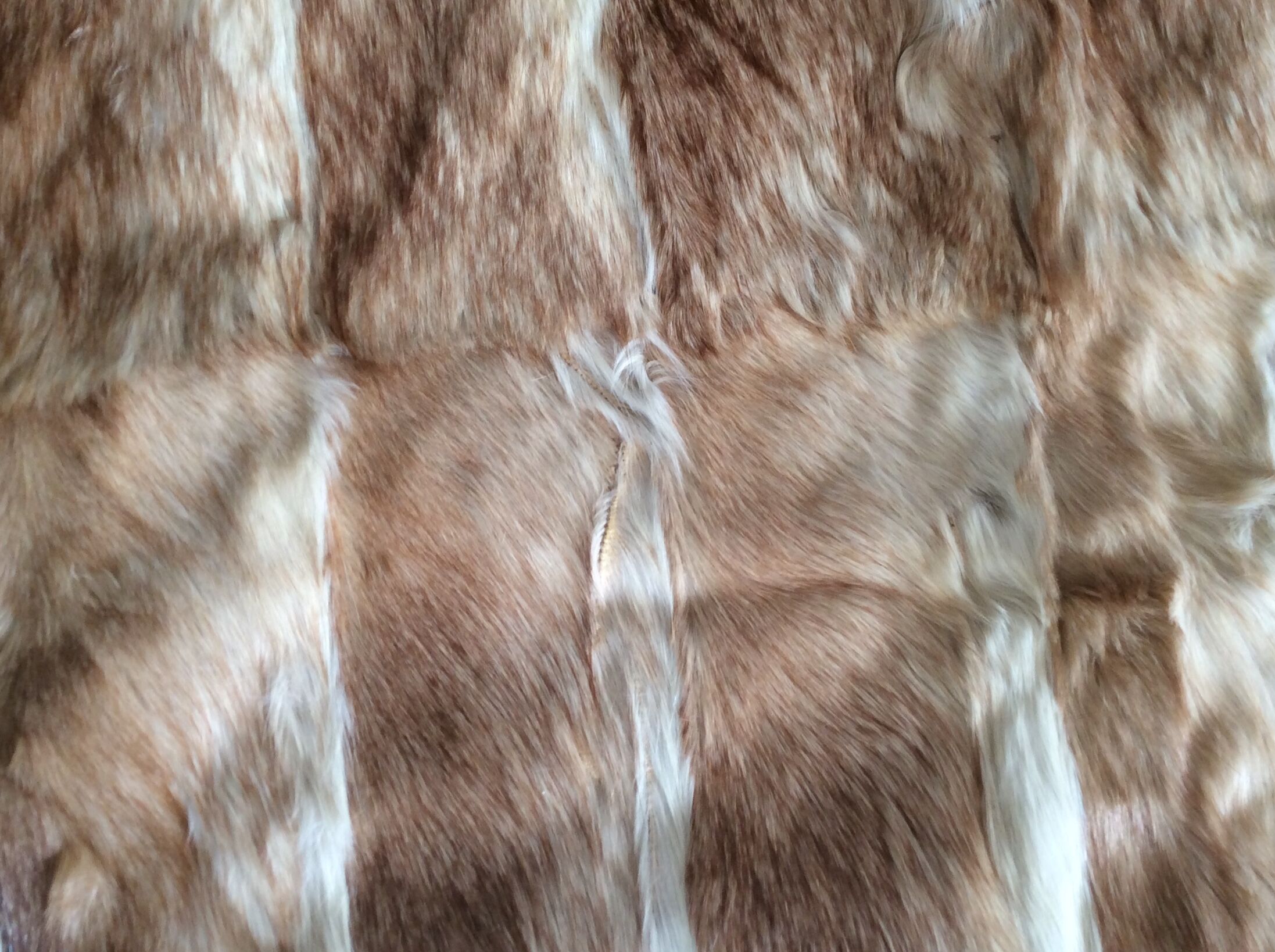 Rabbit skin rug, 200x225cm.