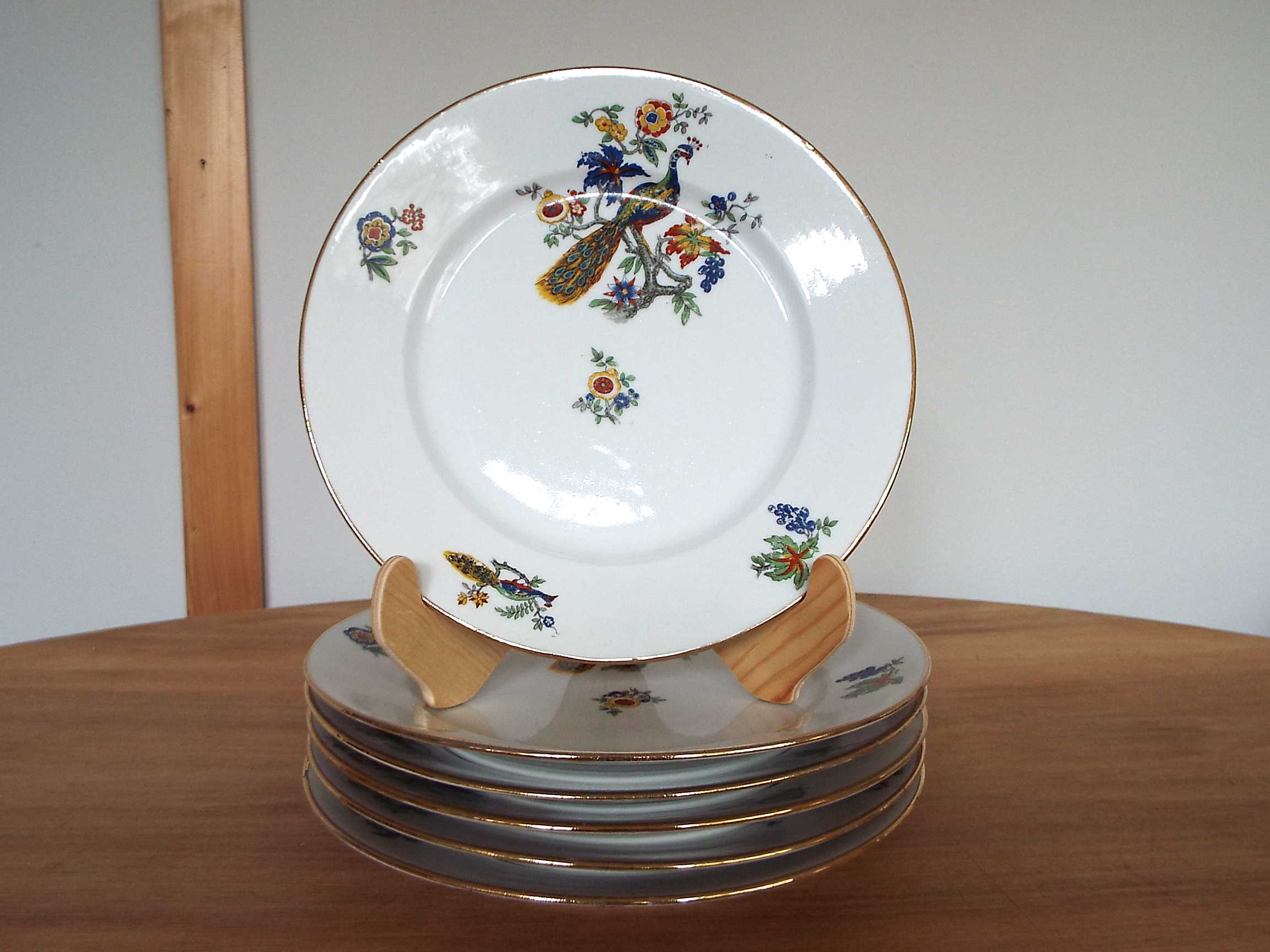 6 flat porcelain plates peacock