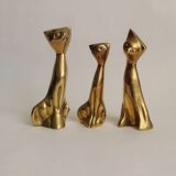 Trio of cats in gilded brass