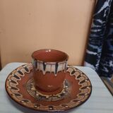 Set of etnic ceramic cups and plates