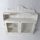old grocery store wall shelf in vintage patinated painted wood