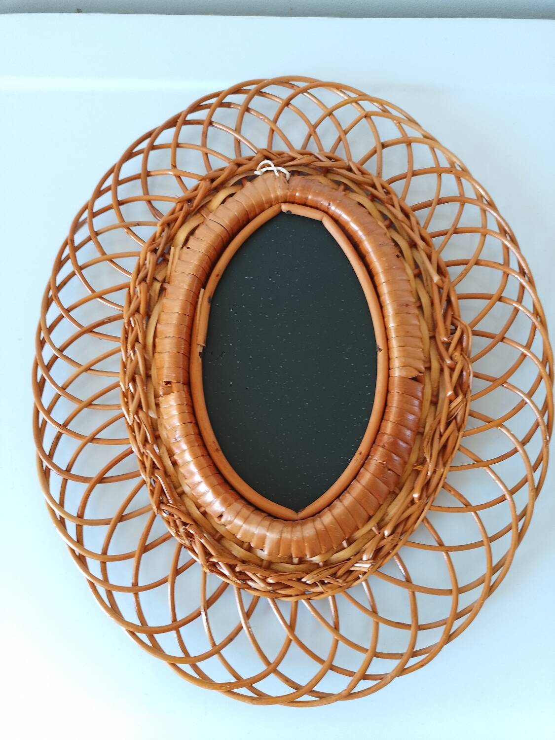 Woven rattan mirror