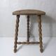 vintage half-moon tripod stool in turned solid wood with beaded edges