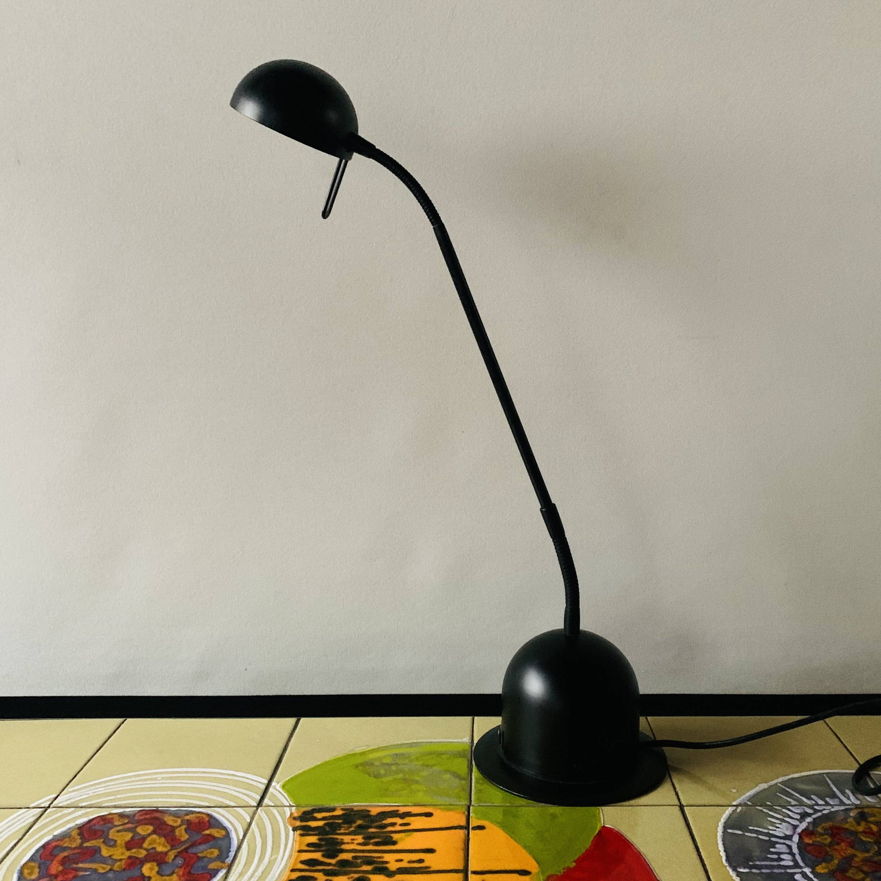 Massive vintage desk lamp in black metal