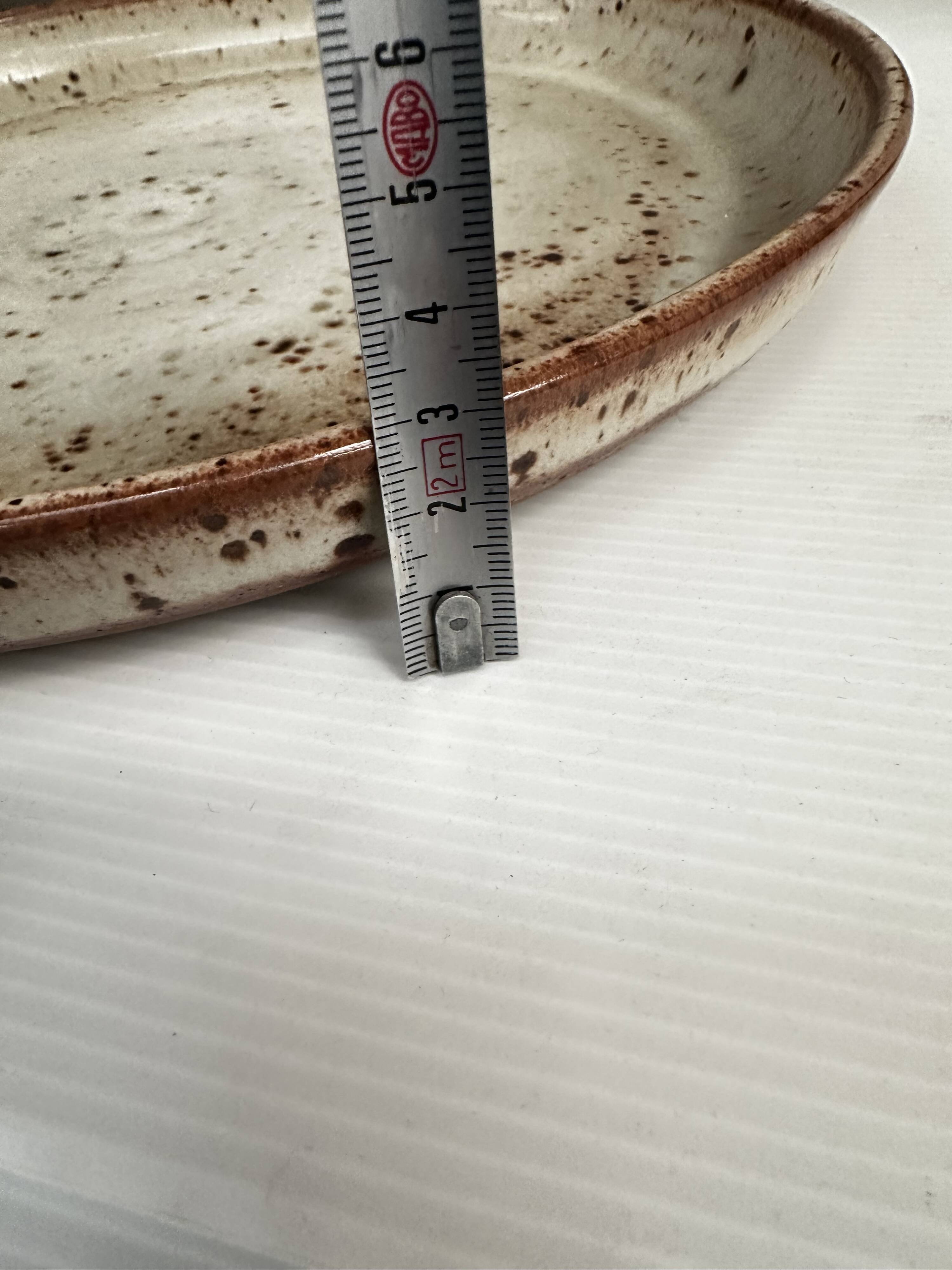 Large round stoneware dish signed Vallauris origin Diameter 30 cm