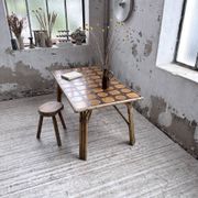 1950s rattan table with ceramic top