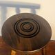 Round tripod stool with turned wooden legs