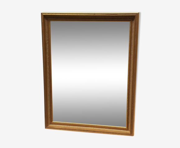 Miroir doré  de style Louis XVI dit à canaux 91x71cm
