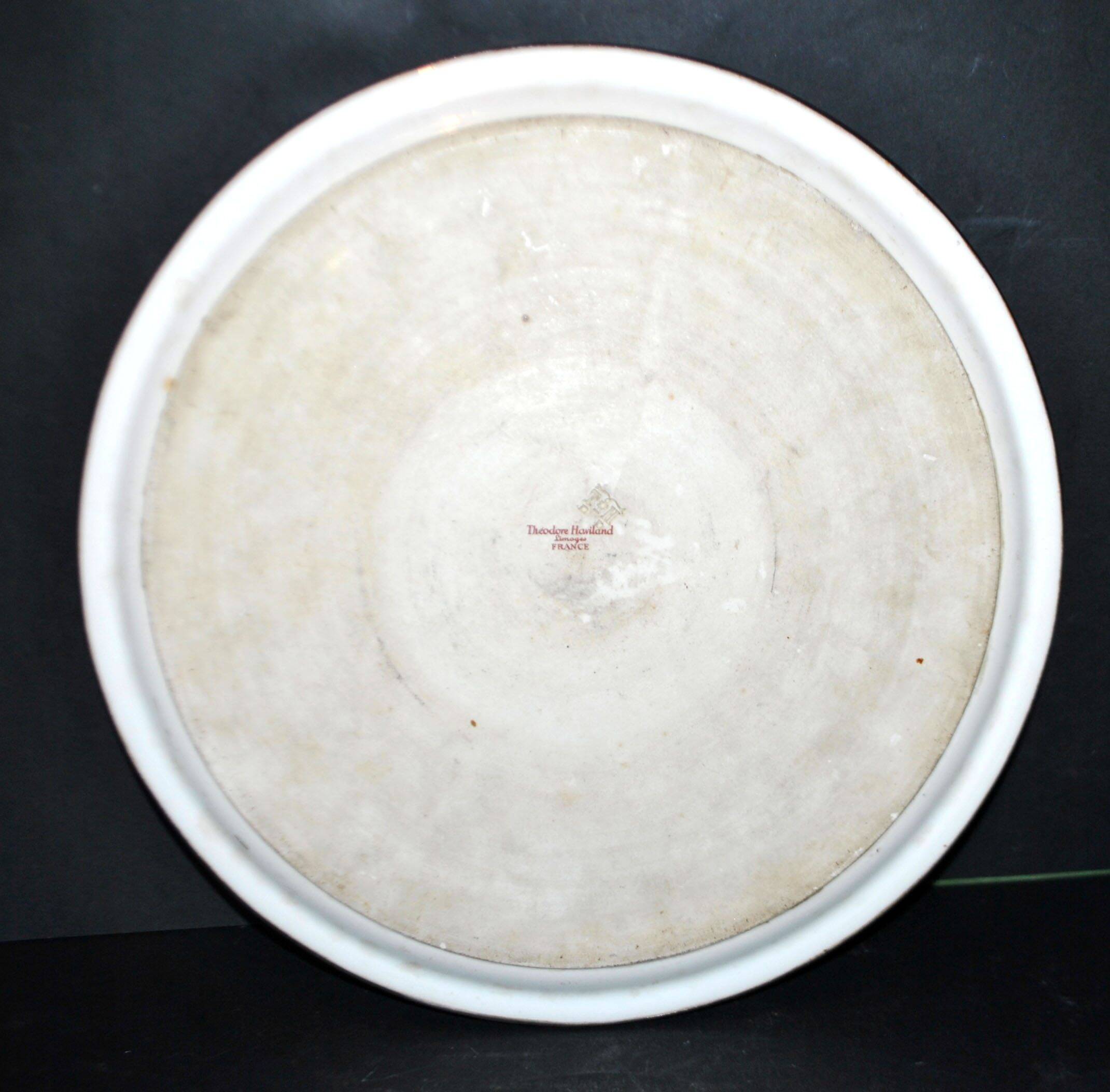Haviland pie dish in Limoges porcelain with a Minerva silver rim.