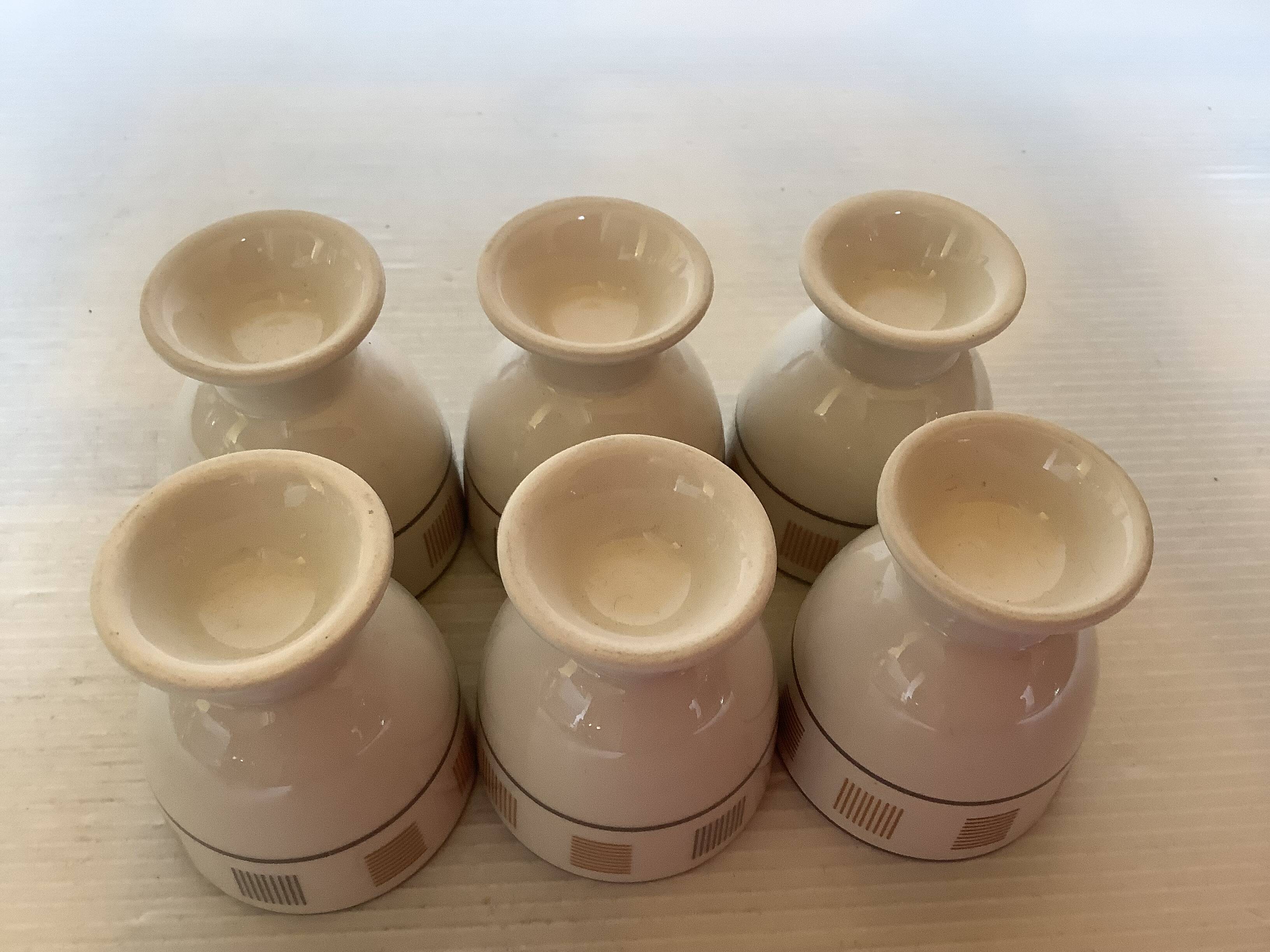 6 coquetiers motifs géométriques beige et marron