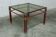 Postmodern Italian design coffee table in smoked glass with red steel structure