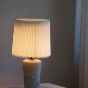 Modern vintage French table lamp, made of stone with fish patterns, 1970s.