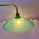 Green vintage plastic wall lamp with a curved arm