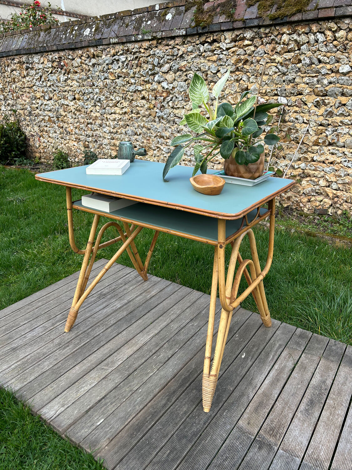 Small vintage rattan desk from the 1960s.